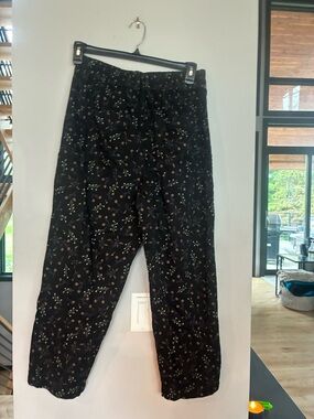 Anthropologie Black Floral Elastic Waist Pants with Subtle Multi-Color Blooms.